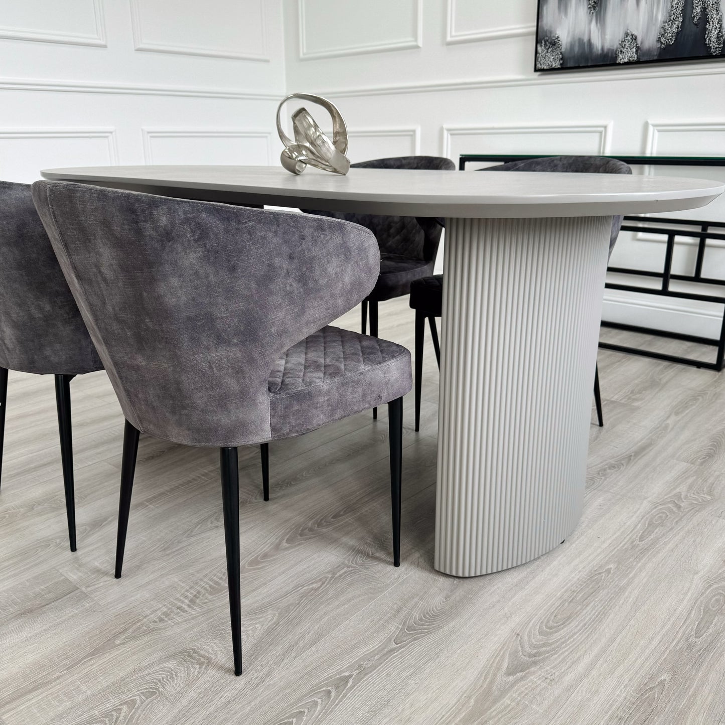 Light Grey Ribbed Wooden Dining Table with Dark Grey Velvet Quilted Chairs