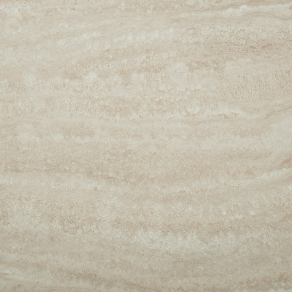 Petra Cream Ceramic Travertine Extending Dining Table With Beige Base