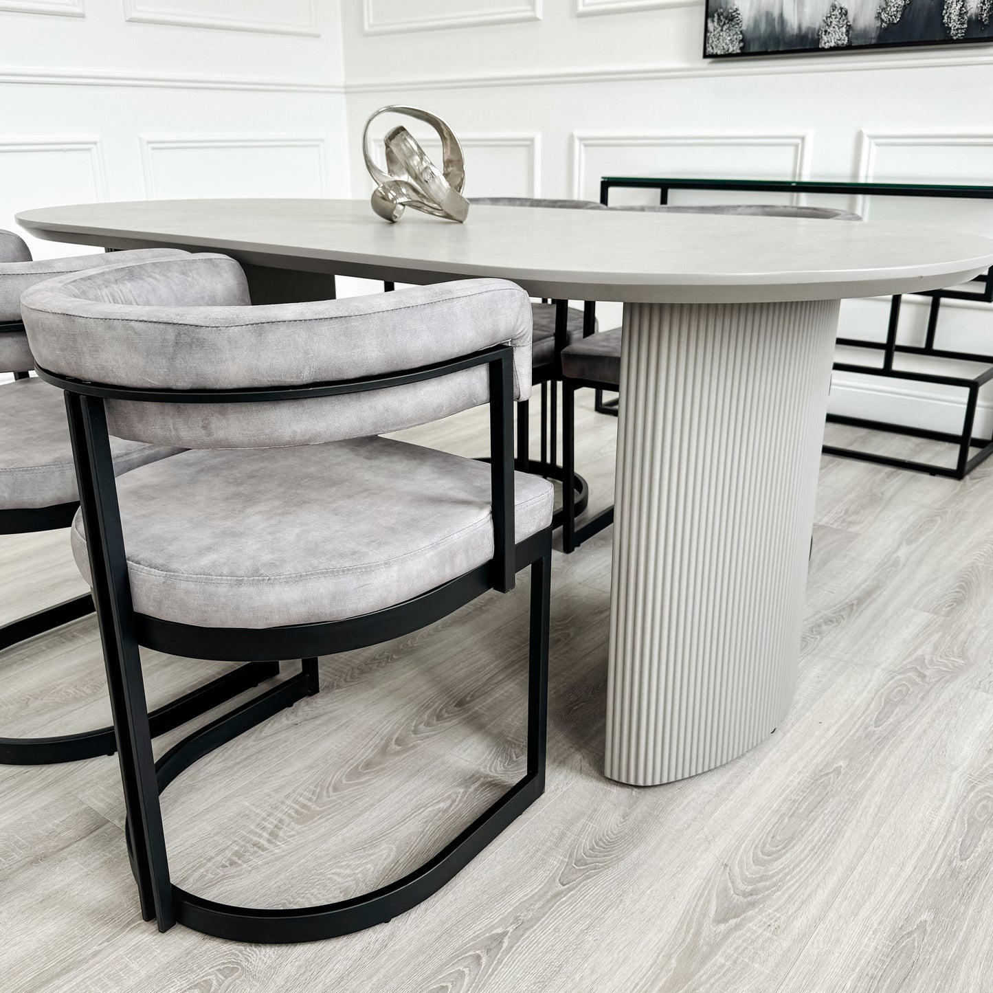 Light Grey Ribbed Wooden Dining Table with Curved Grey Velvet Chairs