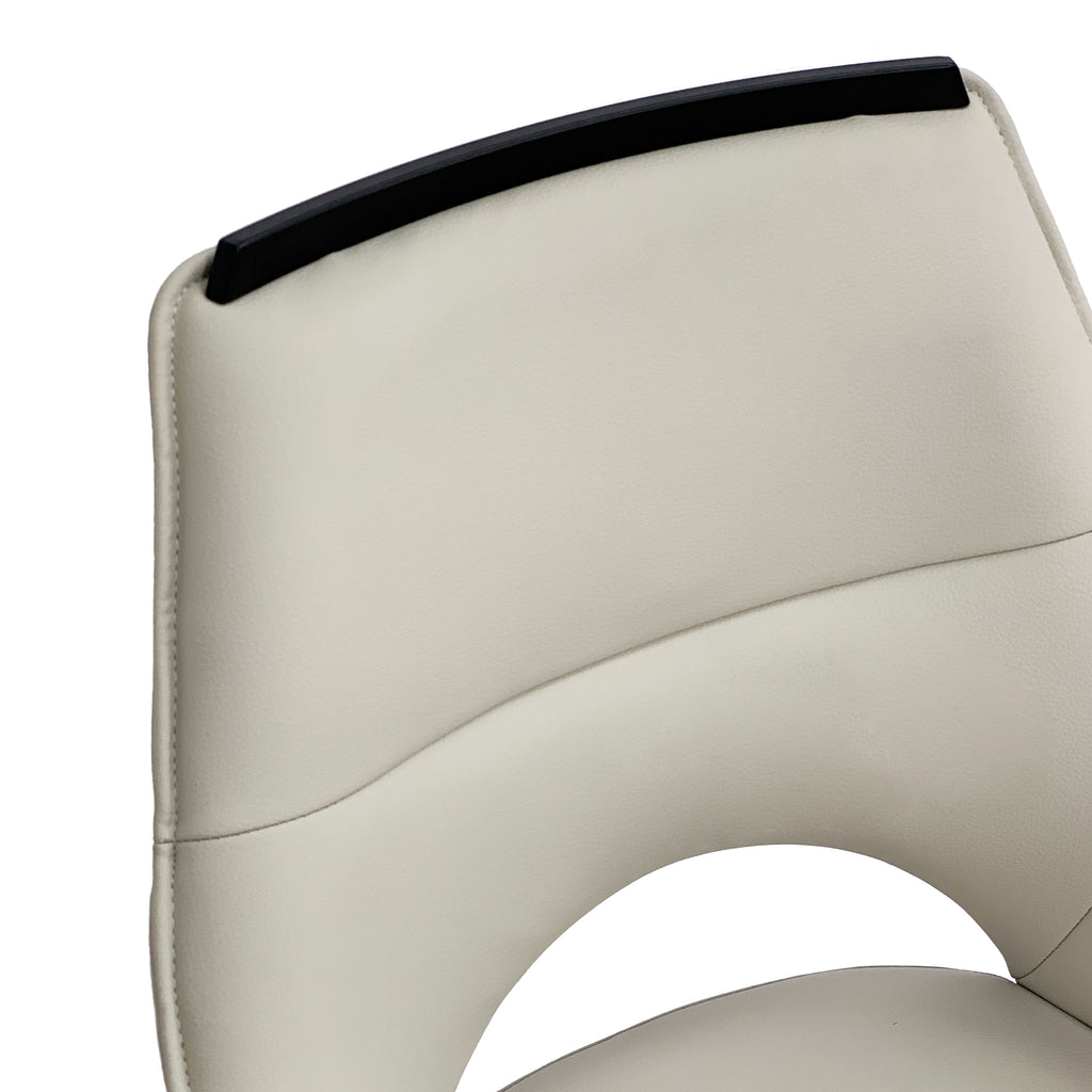 Esme Swivel Cream Leather Dining Chair Black Top Trim With Black Legs