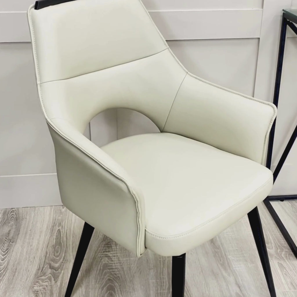 Esme Swivel Cream Leather Dining Chair Black Top Trim With Black Legs