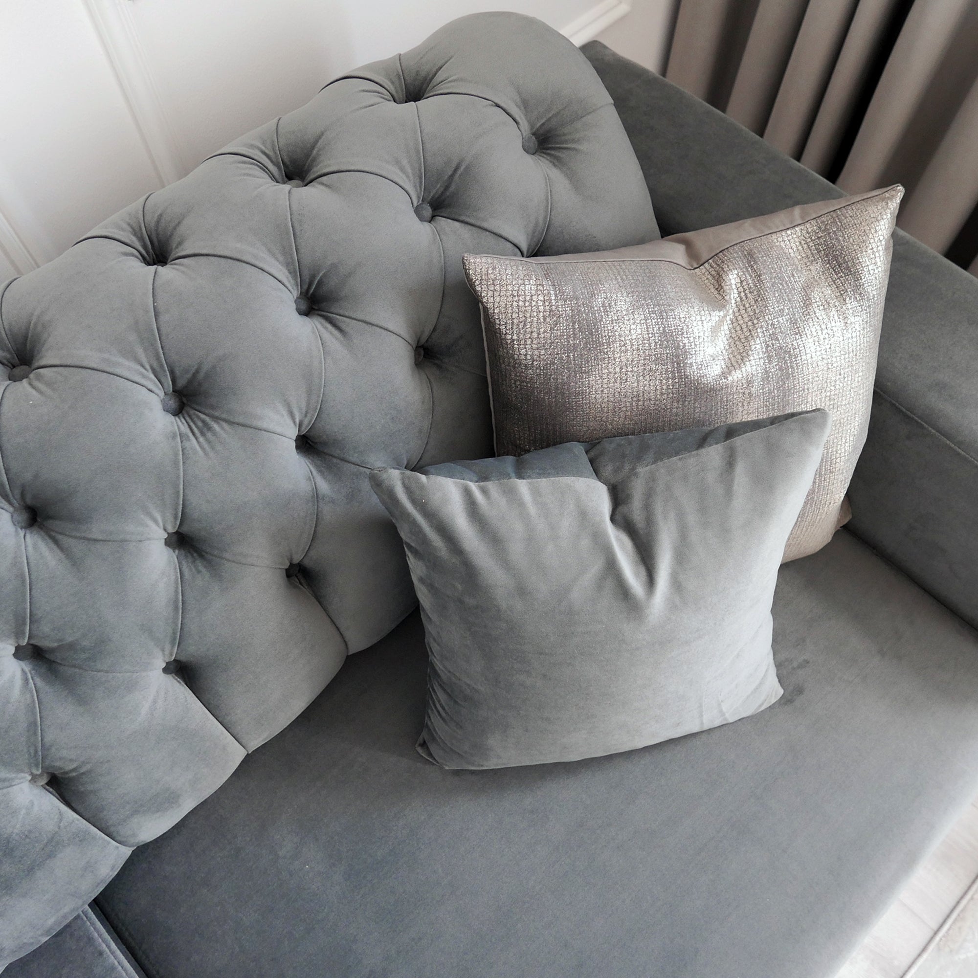 Grey velvet tufted deals sofa